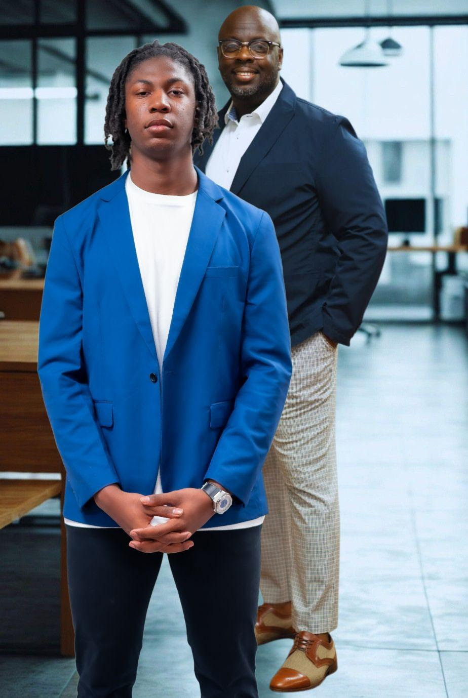 Two men dressed in smart casual attire, one in a blue blazer.